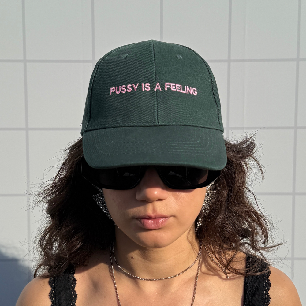PUSSY IS A FEELING DARK GREEN WITH PINK CAP