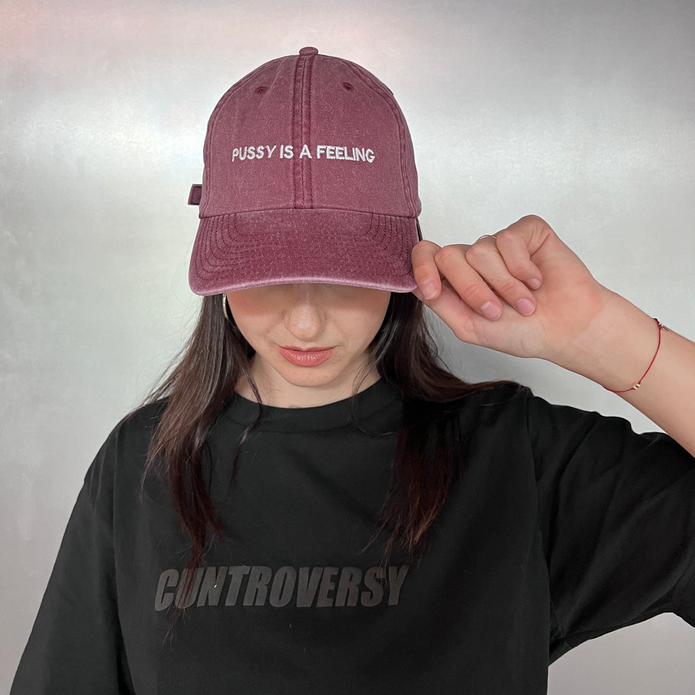 PUSSY IS A FEELING WASHED BURGUNDY DAD CAP