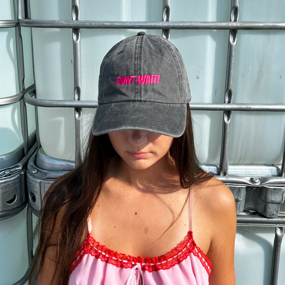 CUNT WAIT WASHED BLACK CAP WITH MAGENTA SIGN