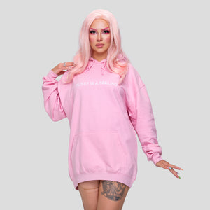 PUSSY IS A FEELING Bledoružová mikina s kapucňou a vyšitým nápisom