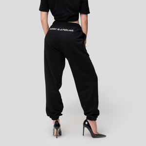 PUSSY IS A FEELING BLACK SWEATPANTS