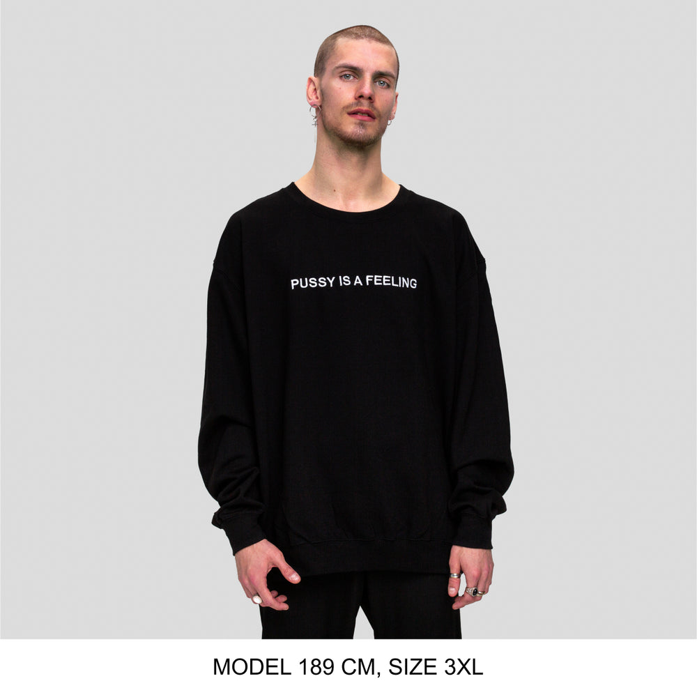 Black crewneck sweater with white PUSSY IS A FEELING embroidery designed by Identities Brand.