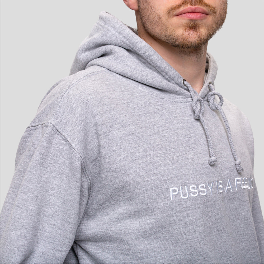 
            
                Load image into Gallery viewer, Gray hoodie with white PUSSY IS A FEELING embroidery designed by Identities Brand.
            
        