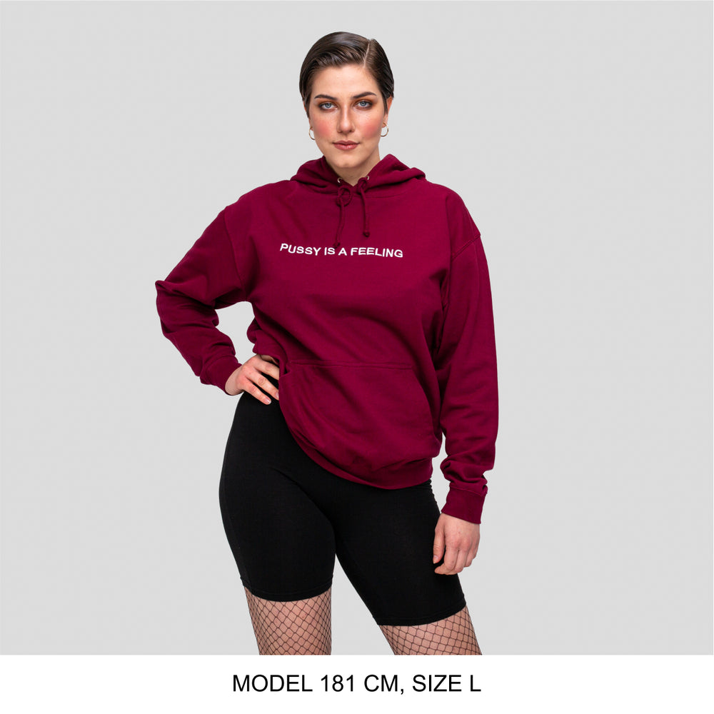 Burgundy hoodie with white PUSSY IS A FEELING embroidery designed by Identities Brand.