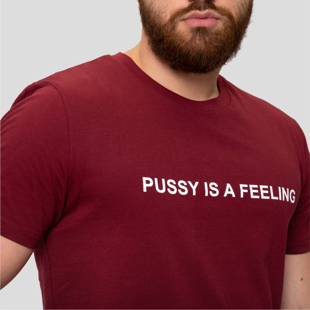Burgundy tshirt with white PUSSY IS A FEELING embroidery designed by Identities Brand.
